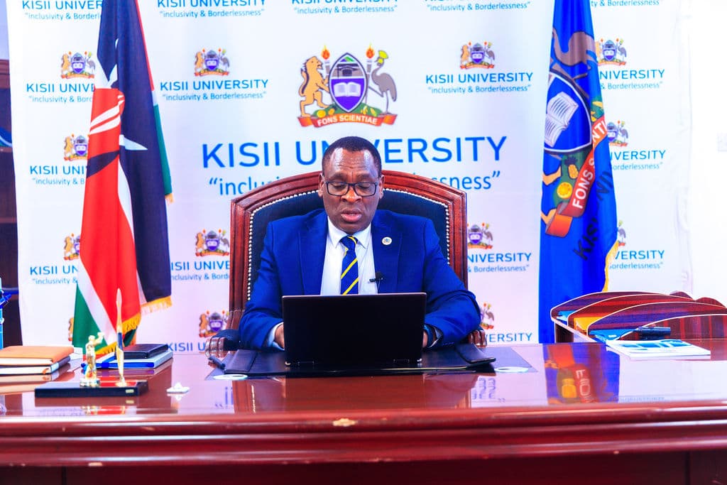 Prof. Dr. Nathan Oyori Ogechi at his office desk, welcoming the university community
